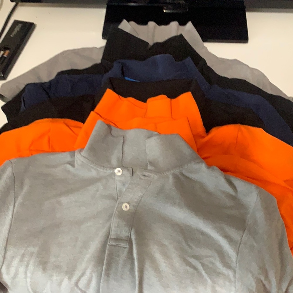 Solid brand new uniform shirts